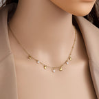 Edelstahlkette mit Künstlichen Perlen und goldenen Anhängern in gold, 40+5m lang.