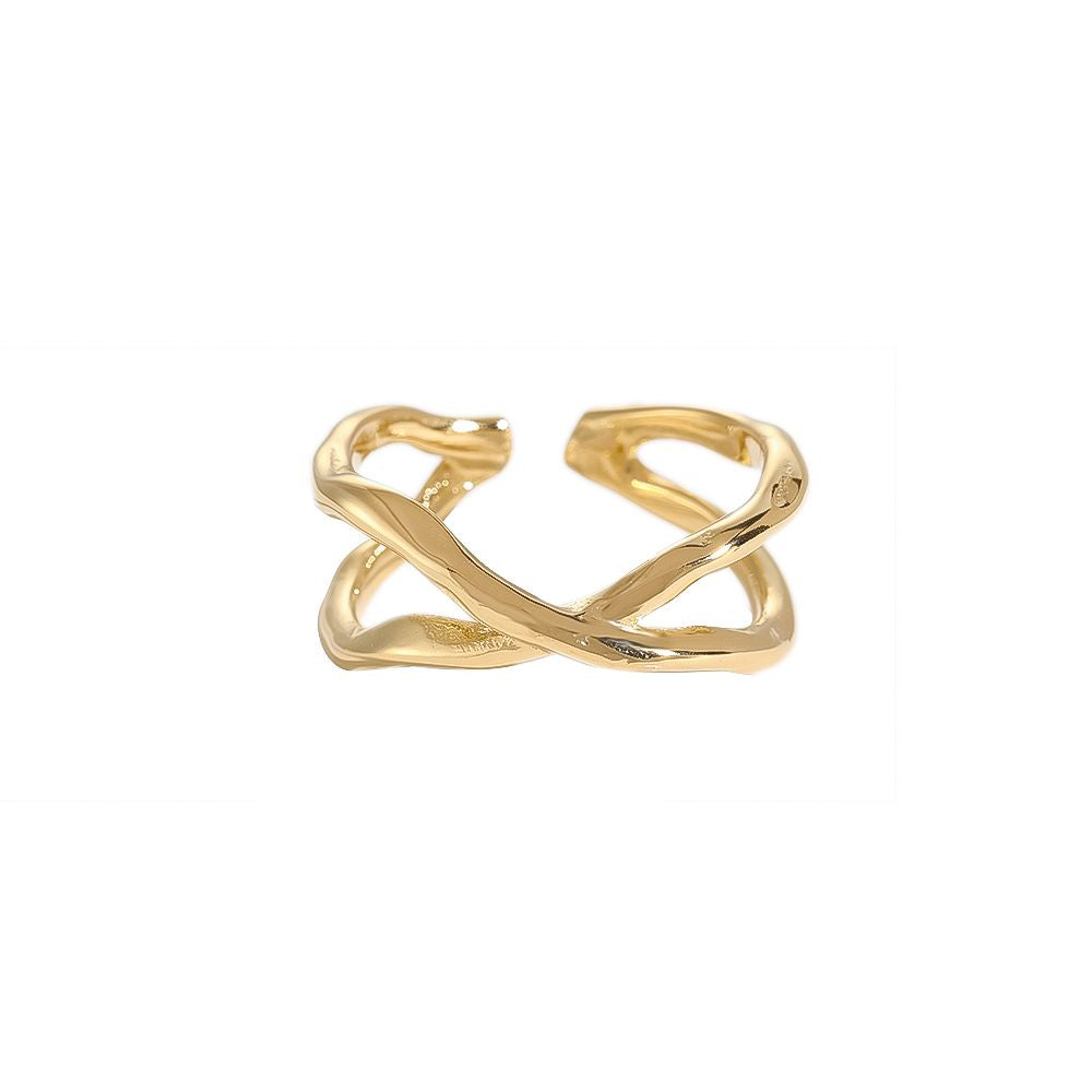 Edelstahlring Überkreuztes Design in gold, größenverstellbar.